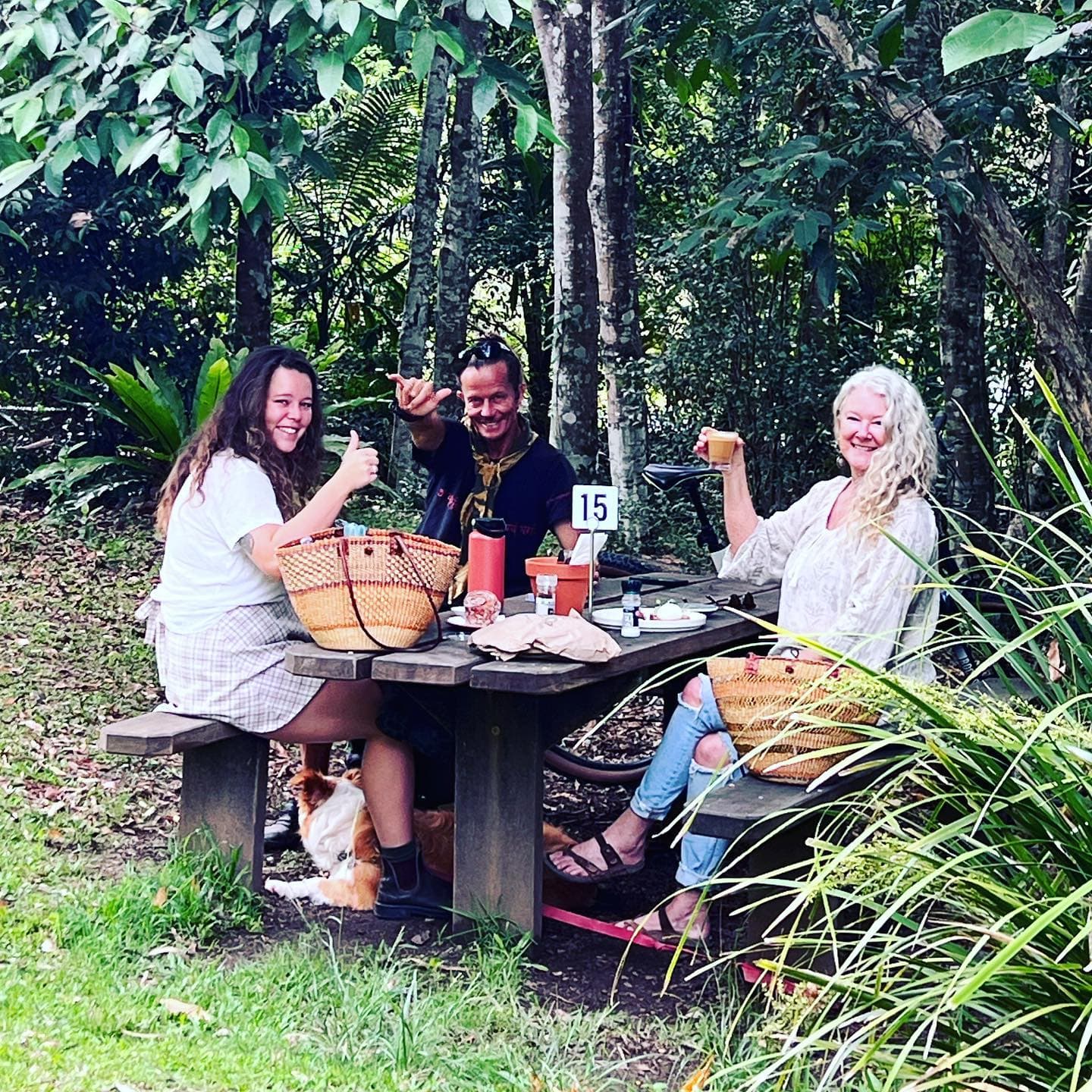 Guests at a table in the gardens at the Fairhill Gardens Café